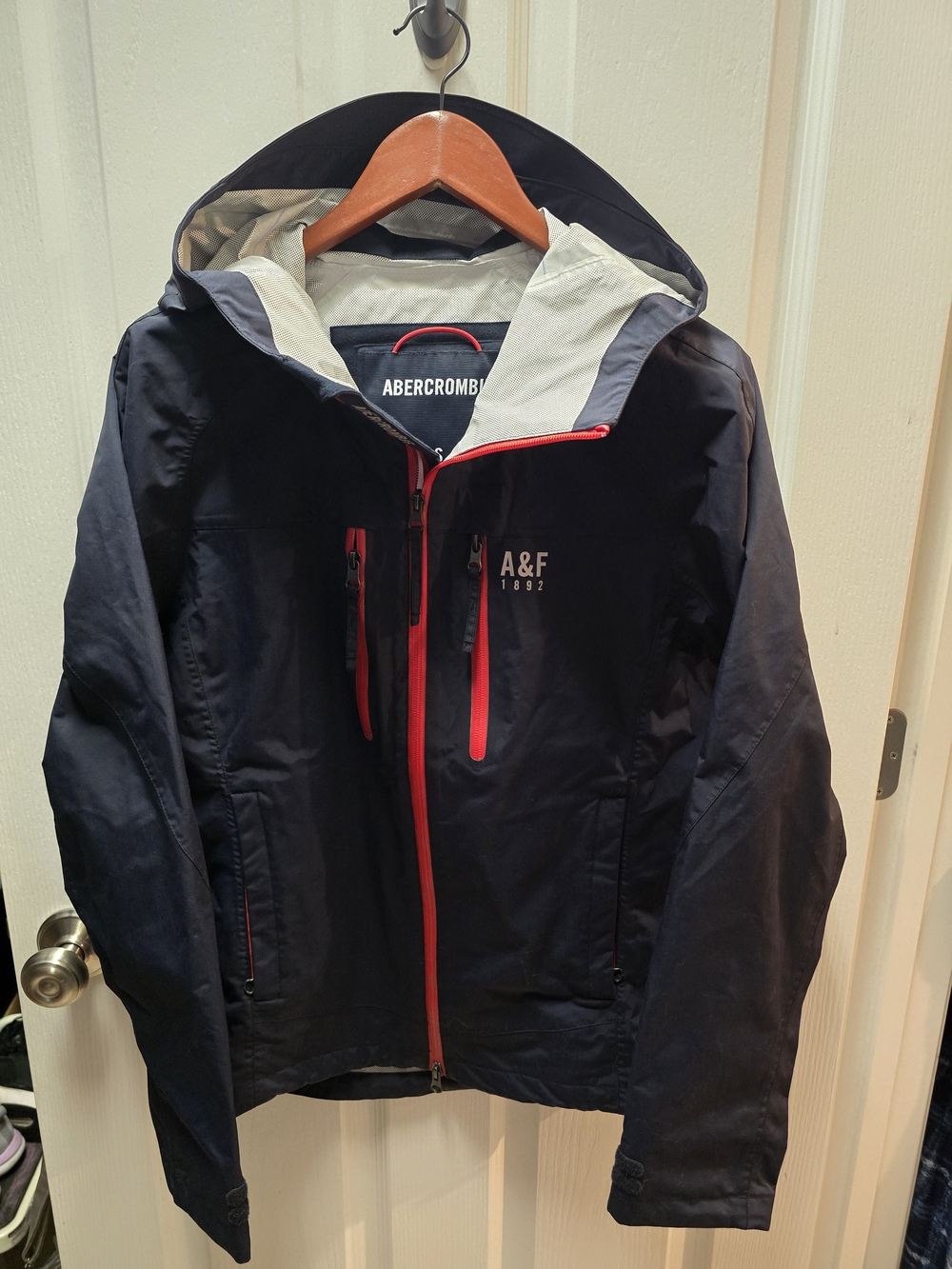 Abercrombie & Fitch Navy Hooded Raincoat with Red Zip Accents